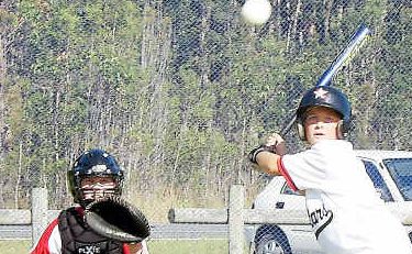 Swinging hard: Braiden Spalding at bat. Swinging hard: Braiden Spalding at bat.